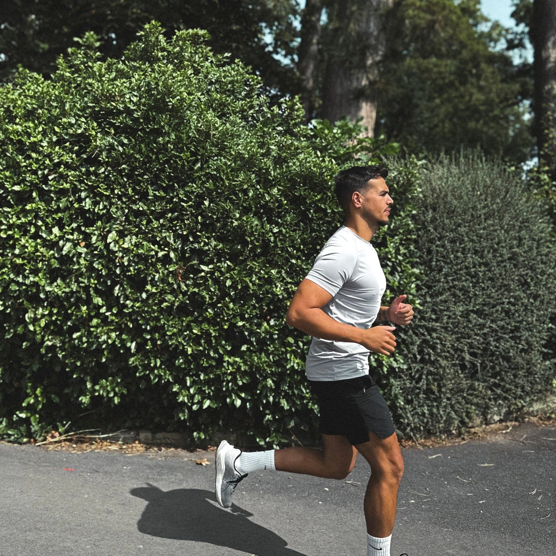 Elevate Your Game with the Grey Performance Top - WeSurvive